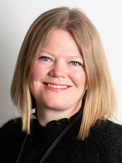 Link to the University chaplains from the Church of Norway. Photo of a smiling woman with blonde hair.